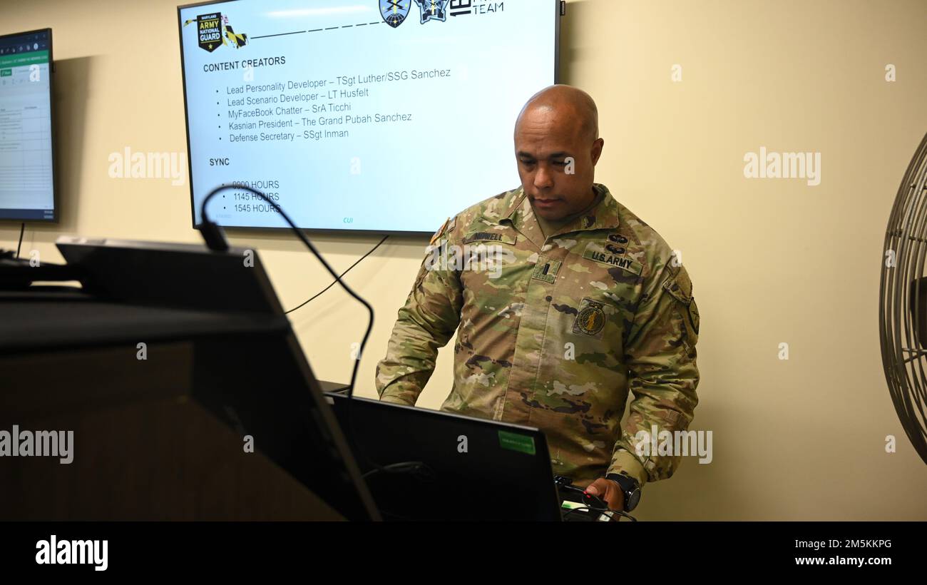 U.S. Army 1st Lt. Clarence Nowell, mission element lead for the 169th Cyber Protection Team, Maryland Army National Guard prepares his workstation before the start of Cyber Blitz 22-3 at Warfield Air National Guard Base, Middle River, Maryland on March 23, 2022. The Cyber Blitz exercise is a constantly evolving cyber exercise, which aims to deliver realistic offensive operations and adversarial effects against cyber protection elements conducting defensive operations on a virtual network. Stock Photo