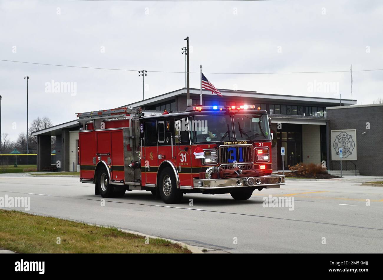 Streamwood, Illinois, USA. Fire truck or engine responding to a 911 fire call dispatched this unit to a suburban Chicago address. Stock Photo