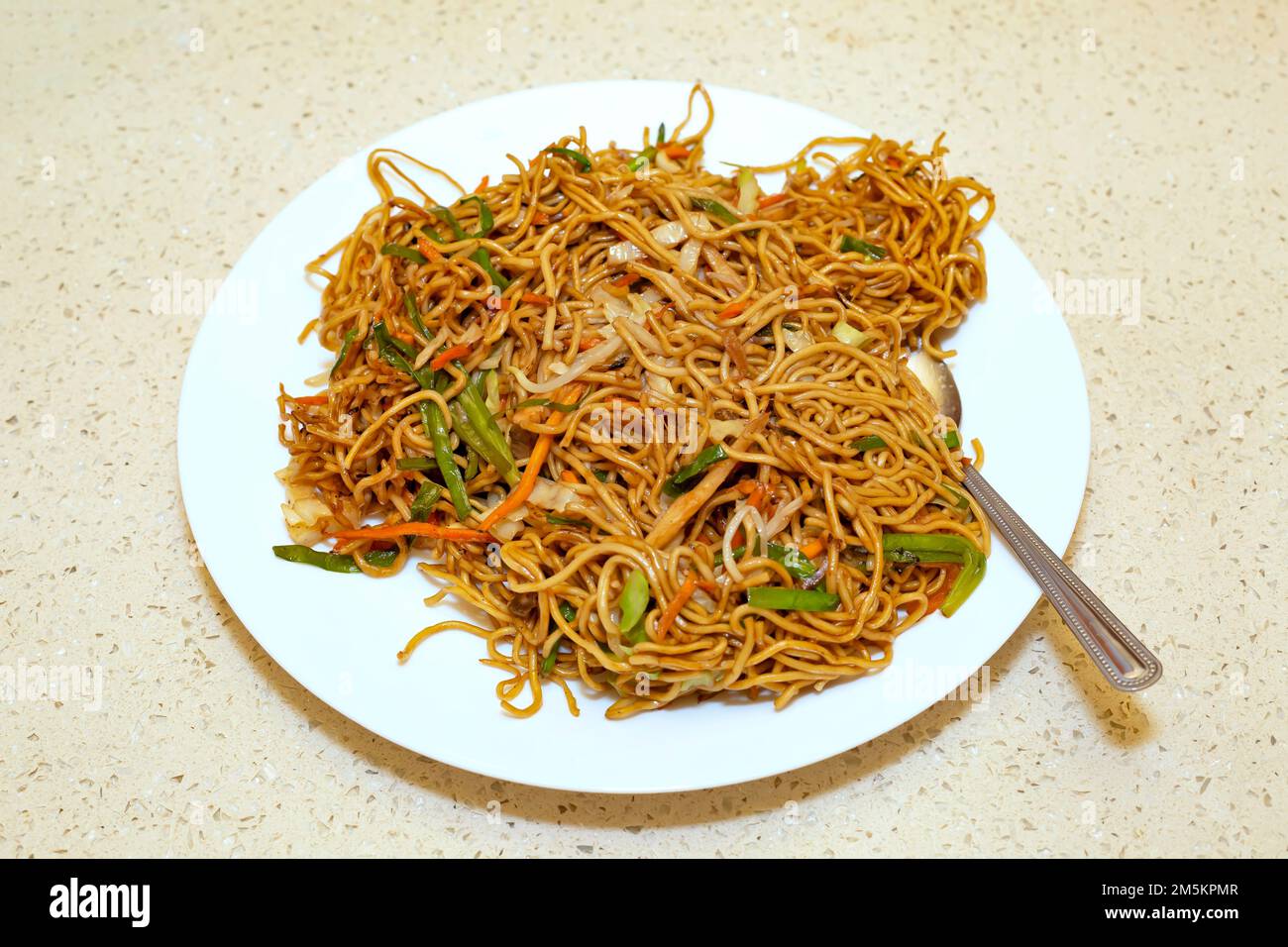 Chicken and prawn Fried noodles on a plate Stock Photo - Alamy