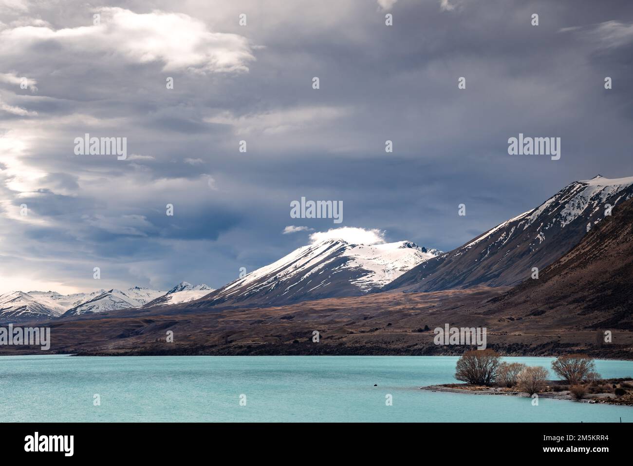 Scenic view of Lake Tekapo east bank. Beautiful view driving along the ...