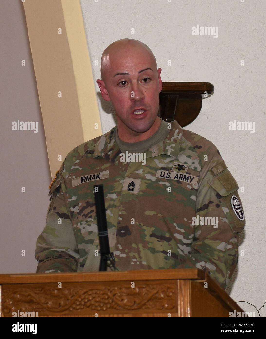 U.S. Army Master Sgt. Ilker Irmak, Public Health Command Europe senior enlisted advisor (interim Sgt. Maj.) provides remarks during a Relinquishment of Responsibility Ceremony, March 23, 2022 at Landstuhl, Germany. Stock Photo