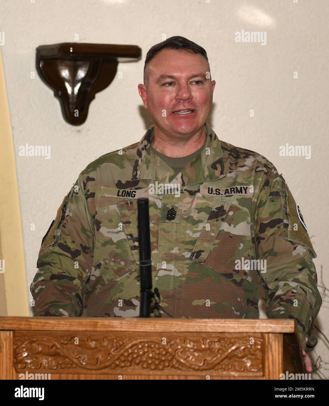 U.S. Army Sgt. Maj. Brett Long, outgoing Public Health Command Europe Sergeant Major, provides remarks during his Relinquishment of Responsibility Ceremony, March 23, 2022 at Landstuhl, Germany. Stock Photo