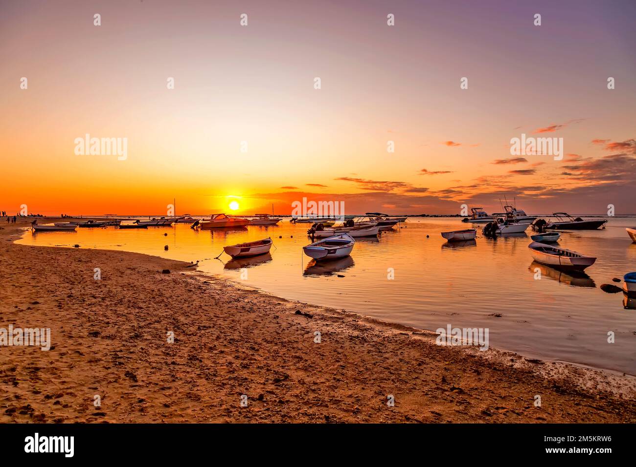 Sunset at the beach of Flic en Flac in the west of the island of Mauritius. Stock Photo