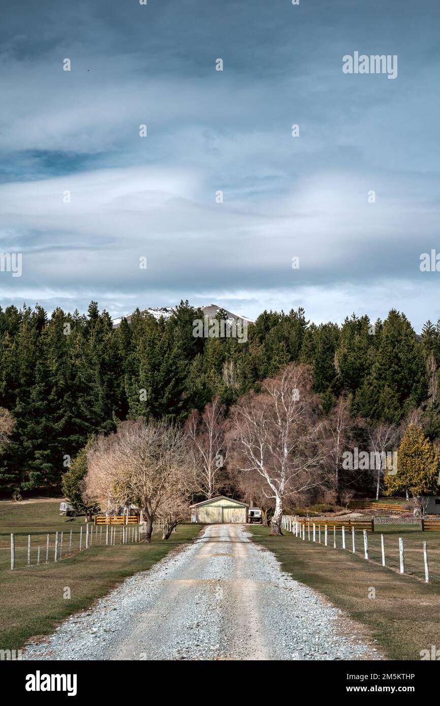 Scenic view of Lake Tekapo east bank. Beautiful view driving along the Lilybank Road from Lake Tekapo Park towards Motuariki View Point. Stock Photo