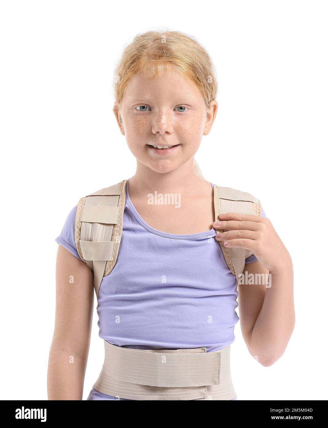 Little girl in back brace on white background Stock Photo Alamy