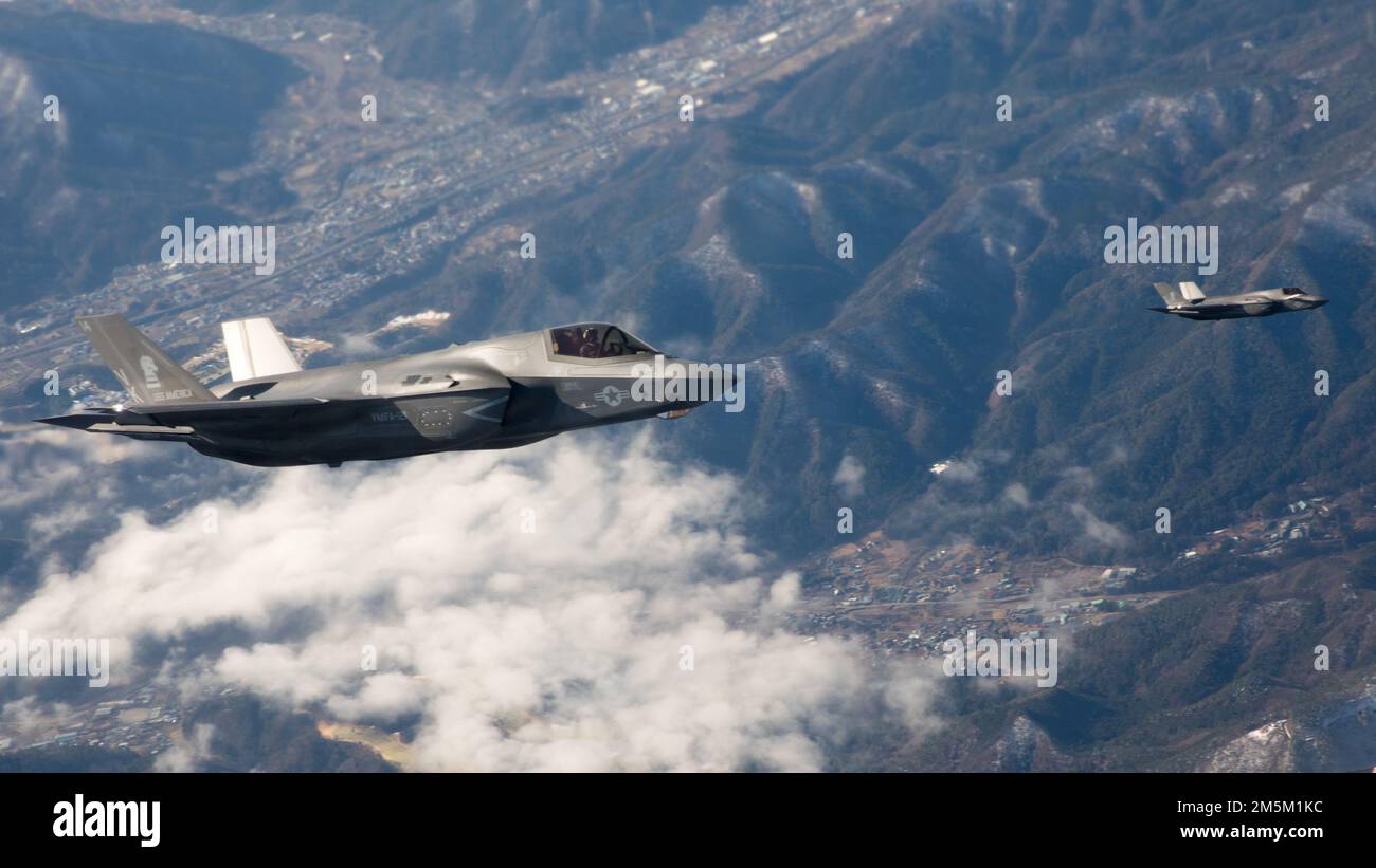 U.S. Marine Corps F-35B Lightning II’s with Marine Fighter Attack Squadron (VMFA) 121 fly near Mt. Fuji, Japan, March 23, 2022. Marines with Marine Aerial Refueler Transport Squadron 152 supported Marines with VMFA-121 during a training flight simulating close air support at Camp Fuji, Japan. Marine Corps aviation routinely conducts training throughout the region to remain combat-ready in support of a free and open Indo-Pacific and to demonstrate our commitment to the Treaty of Mutual Cooperation and Security between the U.S. and Japan. Stock Photo