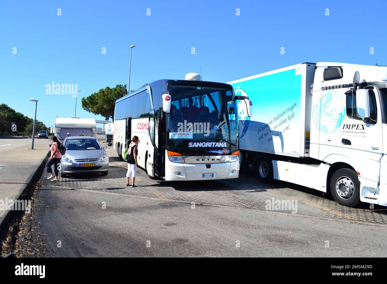 cosmos tours bus stopped at roadside rest stop on European tour. Stock Photo