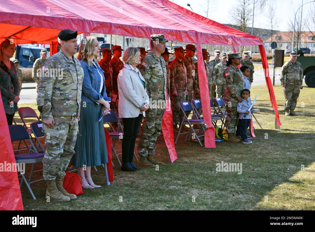 The command team of the 41st Field Artillery Brigade, family members