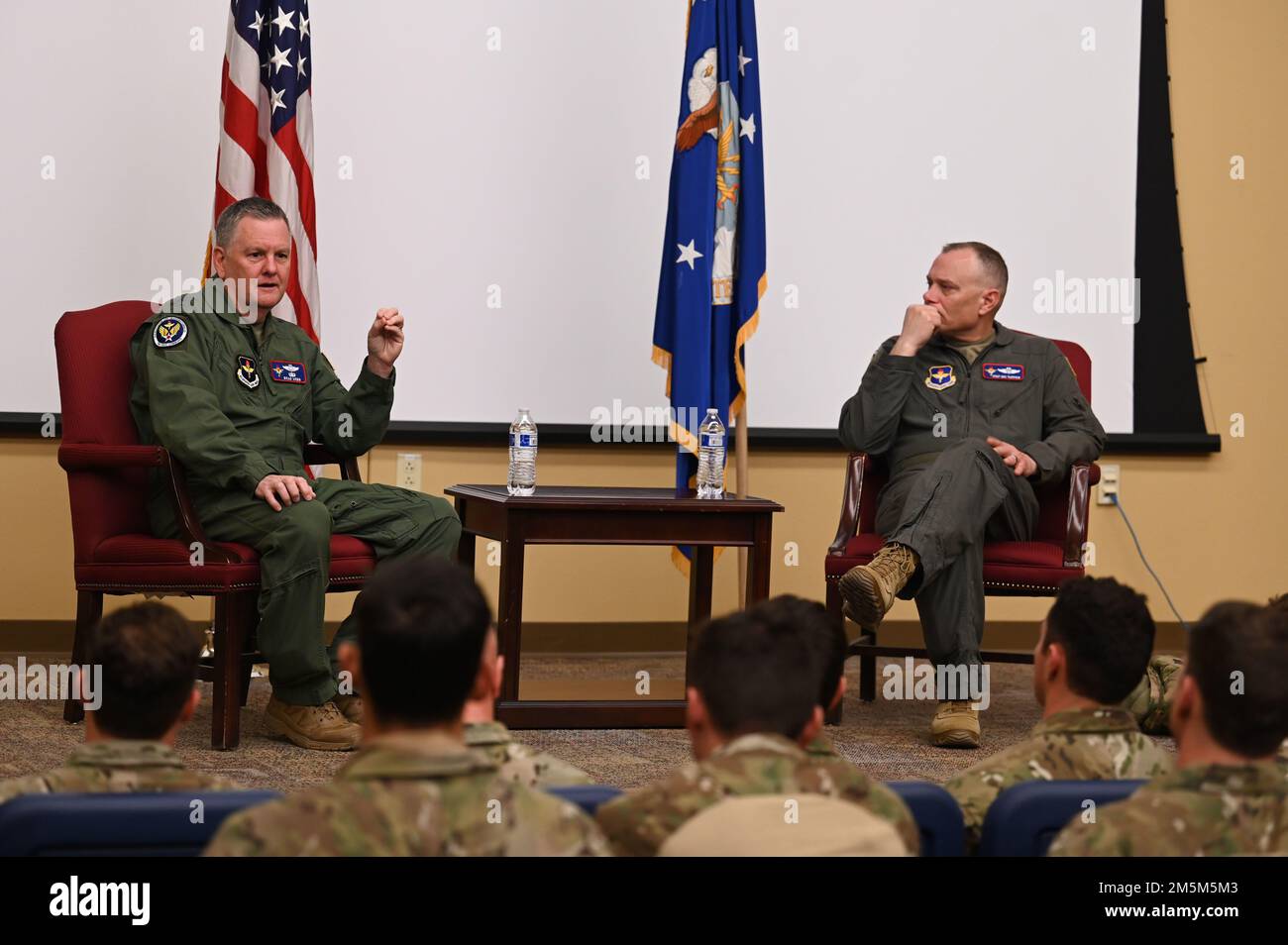 U.S. Air Force Lt. Gen. Brad Webb, commander of Air Education and Training Command, and Chief Master Sgt. Erik Thompson, AETC command chief, answer questions from Pararescue and Combat Rescue Officer students at the 351st Special Warfare Training Squadron, Kirtland Air Force Base, N.M., March 24, 2022. Webb and Thompson also spoke with 351SWTS leadership and watched PJ and CRO students practice rappelling. Stock Photo