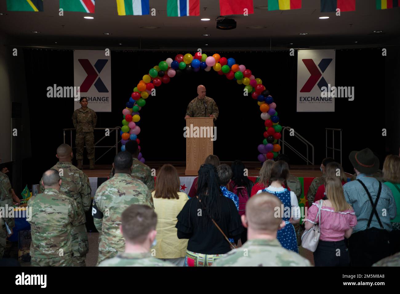 U.S. Air Force Brig. Gen. Josh Olson, 86th Airlift Wing commander, gives opening remarks at Diversity Day 2022 on Ramstein Air Base, Germany, March 24, 2022. The event aimed to enhance cross-cultural and cross-gender awareness while promoting harmony among all military members, their families and the DOD civilian workforce. Stock Photo