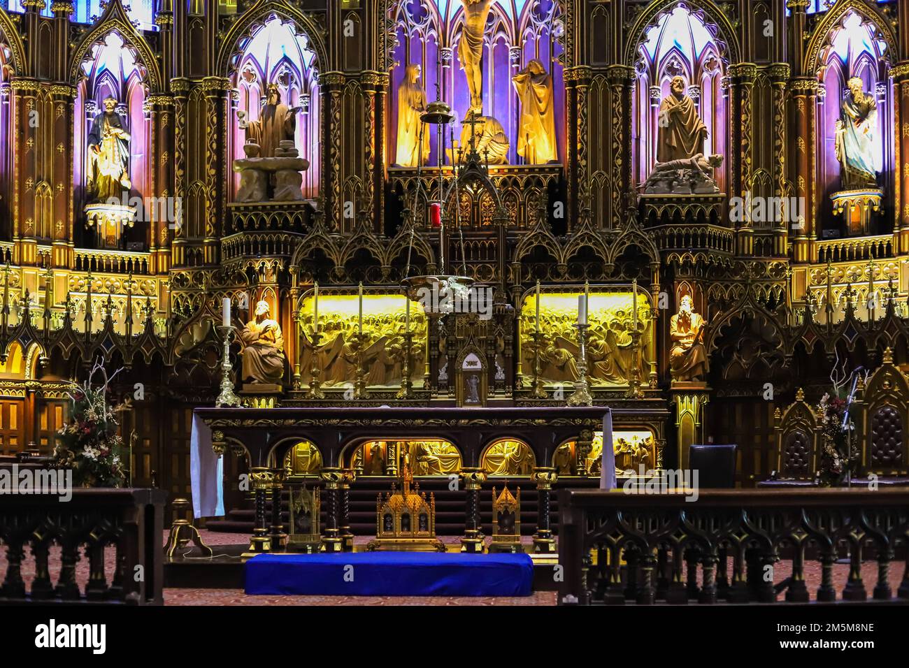 Notre Dame Basilica, inside the Catholic church an altar with icons