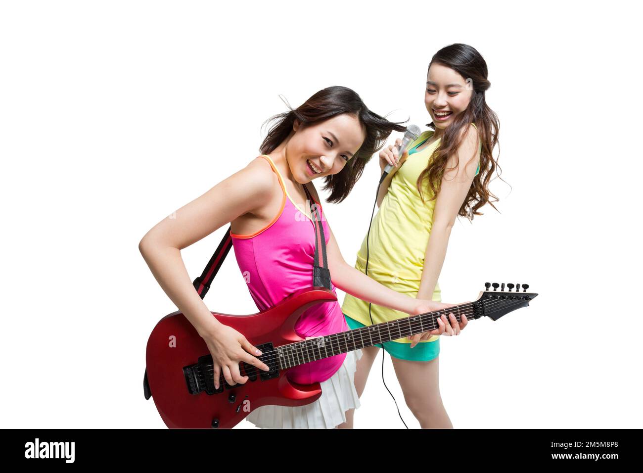 Fashion dynamic young people play the guitar singing Stock Photo