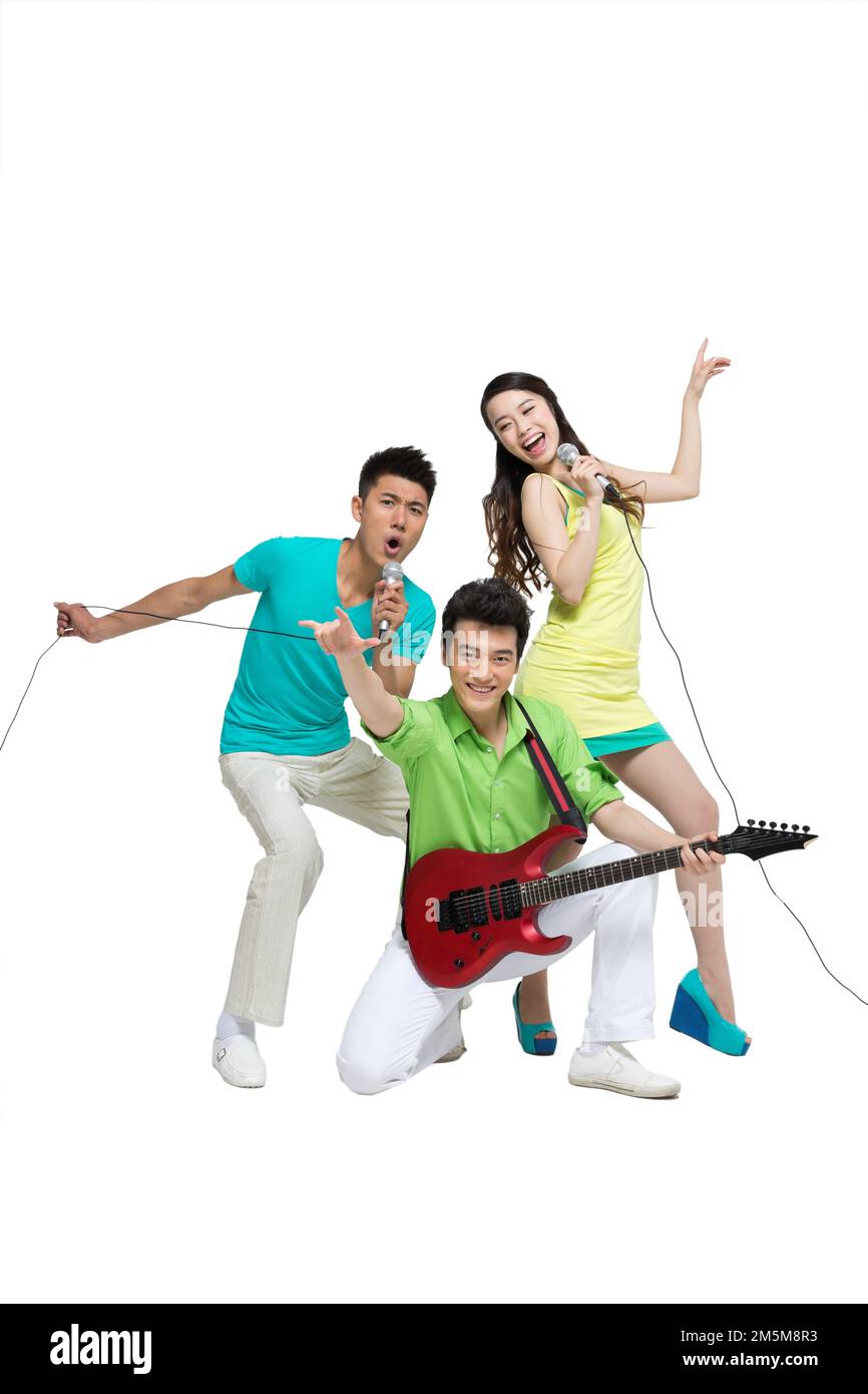 Fashion dynamic young people play the guitar singing Stock Photo Alamy