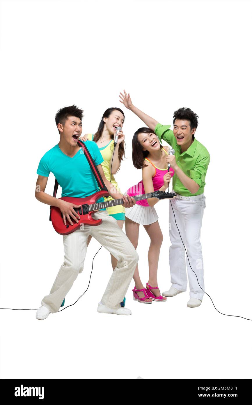 Fashion dynamic young people play the guitar singing Stock Photo