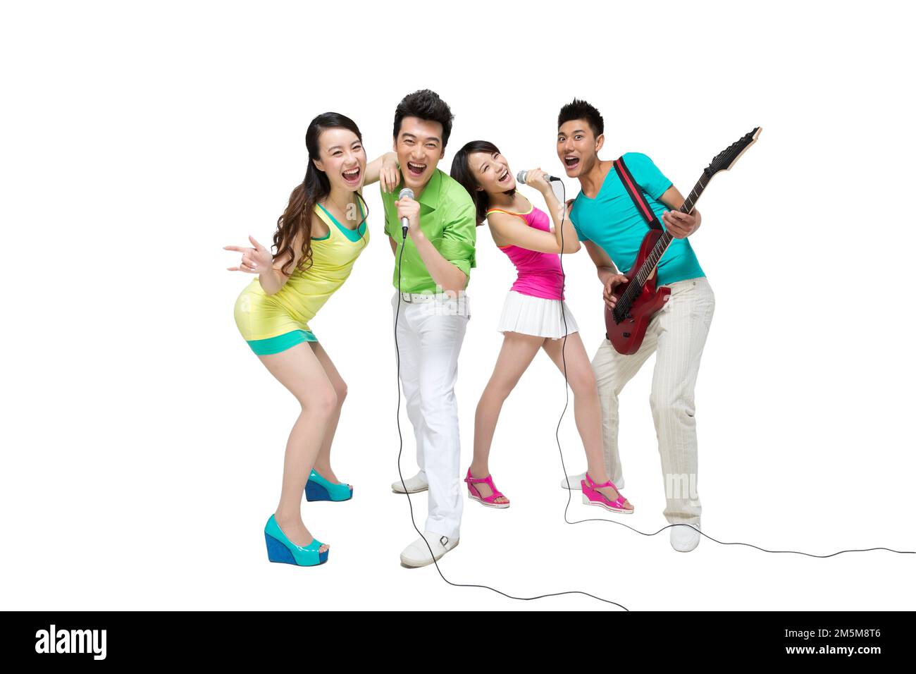 Fashion dynamic young people play the guitar singing Stock Photo Alamy