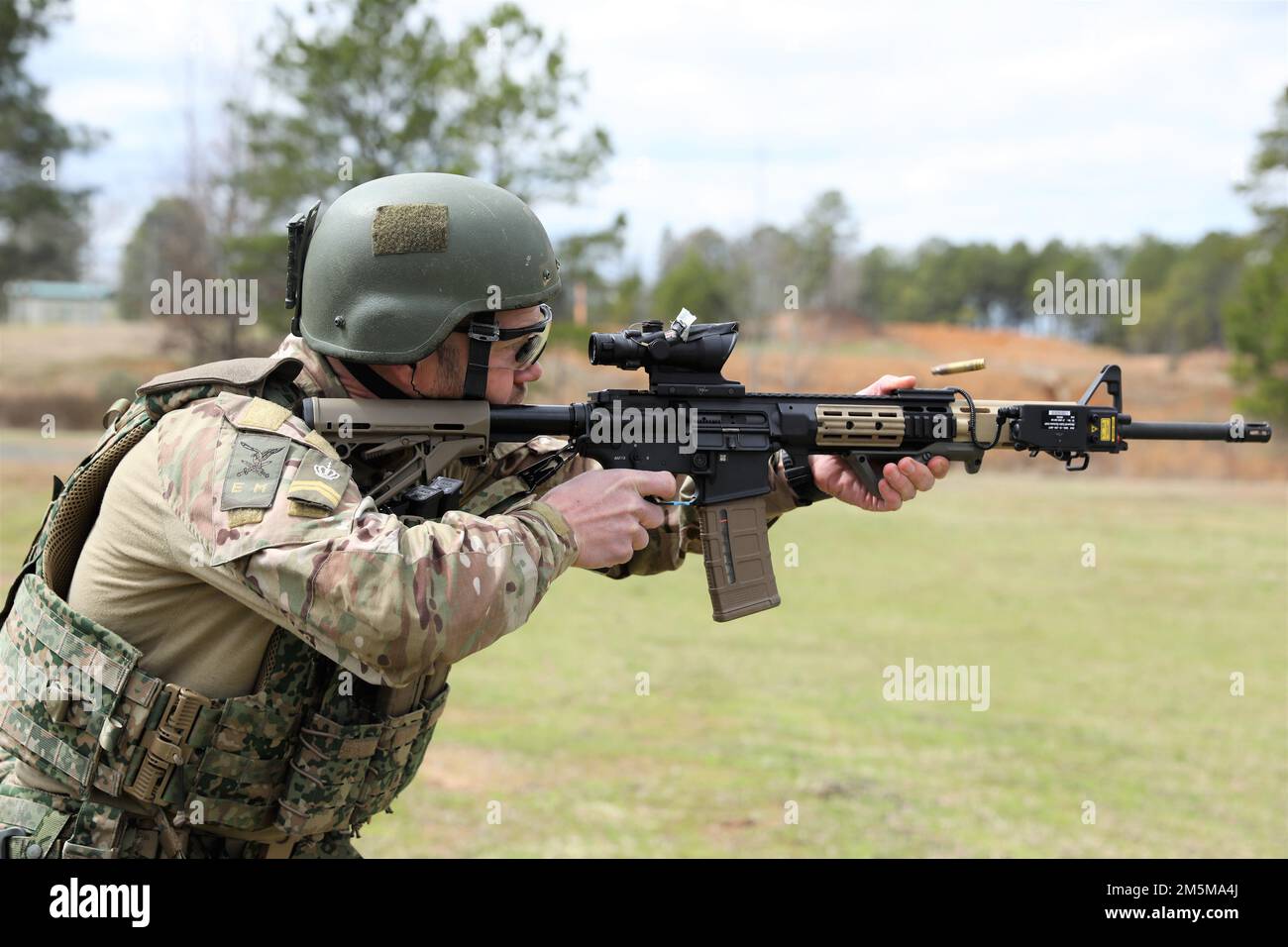 Sgt. Smit from the Royal Netherlands Army runs a shooting lane during