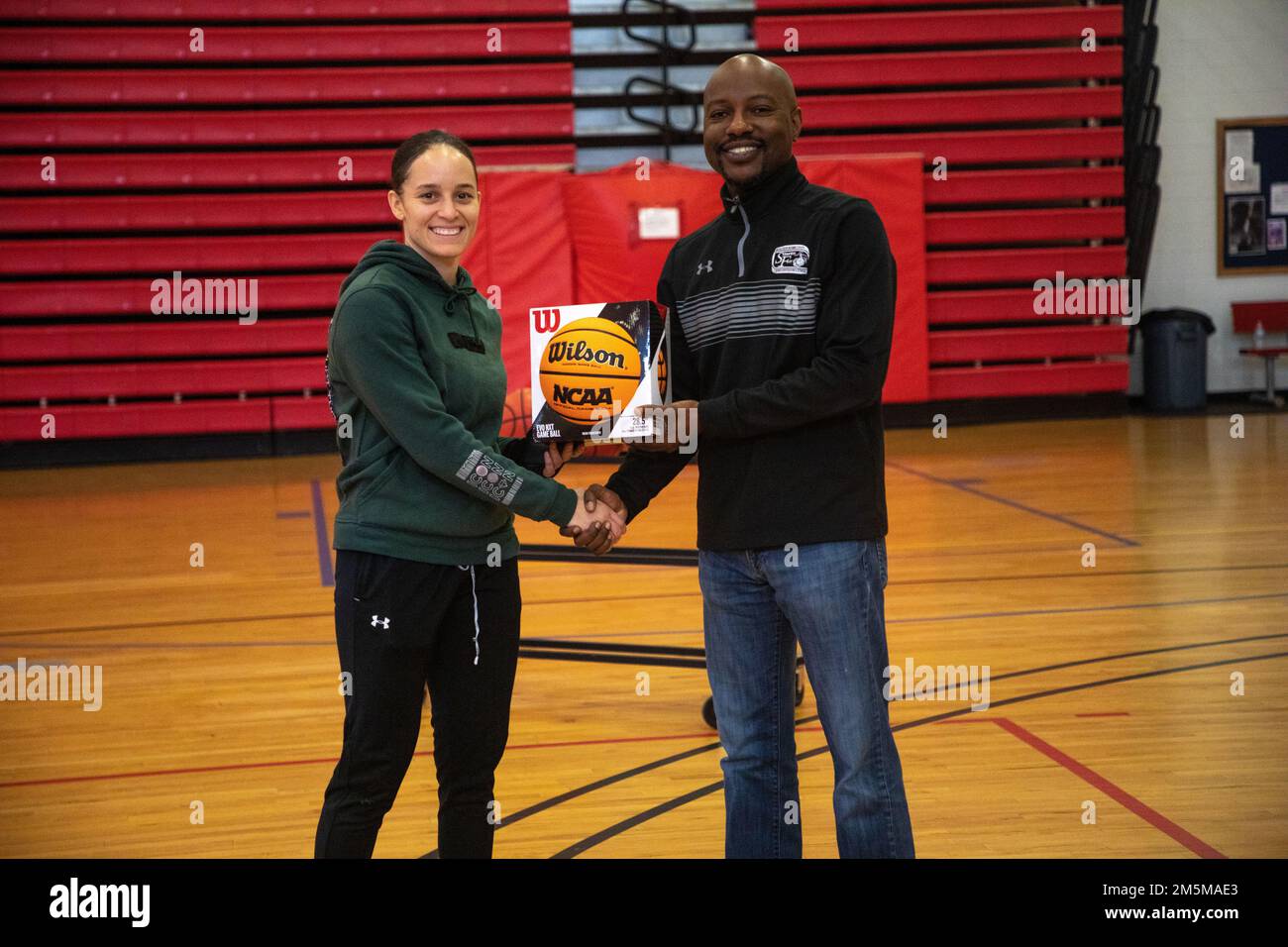 U.S. Marines and civilians participate in the Marine Corps Community