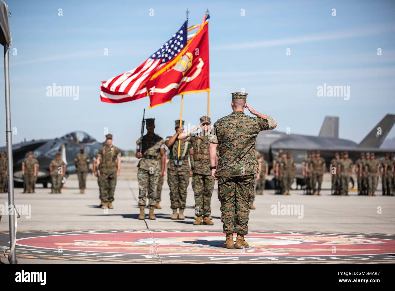 U.S. Marine Corps Lt. Col. Keith W. Bucklew, center, outgoing ...