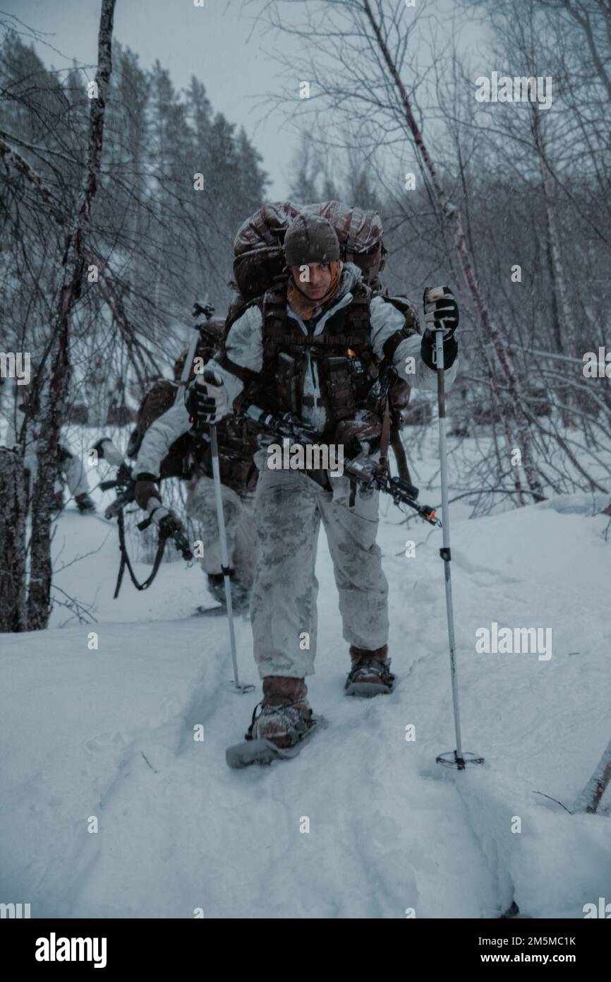 U.S. Marine Corps Staff Sgt. Richard Mikesell moves to an objective ...
