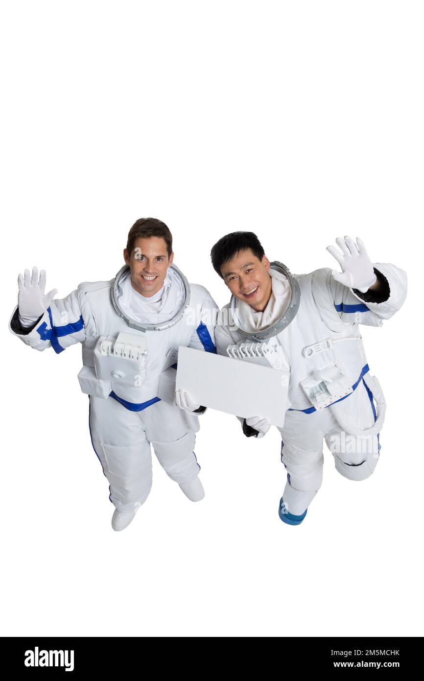 Two astronauts in space suits hi-res stock photography and images - Alamy
