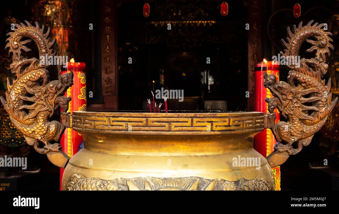Praying place with incense in chinese temple. Chinese New Year concept background image Stock Photo