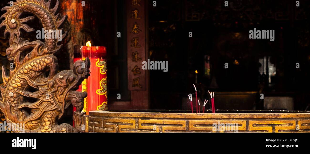 Praying place with incense in chinese temple. Chinese New Year concept background image Stock Photo