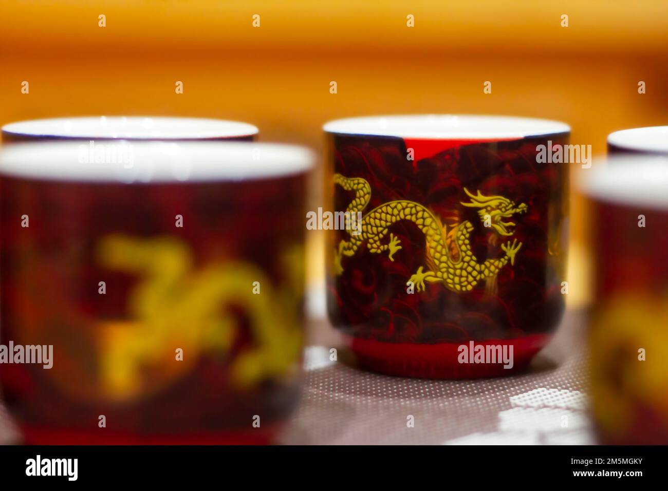 Chinese tea cup set on red background Stock Photo Alamy