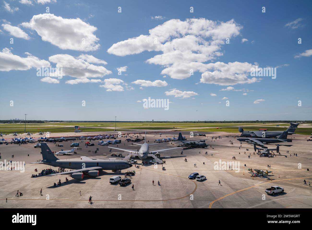 U.S. Air Force aircraft assigned to Air Mobility Command sit parked on the flight line at
