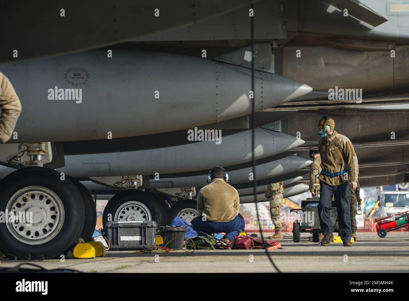 U.S. Air Force crew chiefs assigned to the 44th Aircraft Maintenance ...
