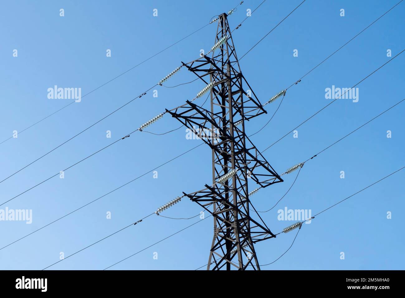 Power line. Highvoltage power transmission tower with wires. High