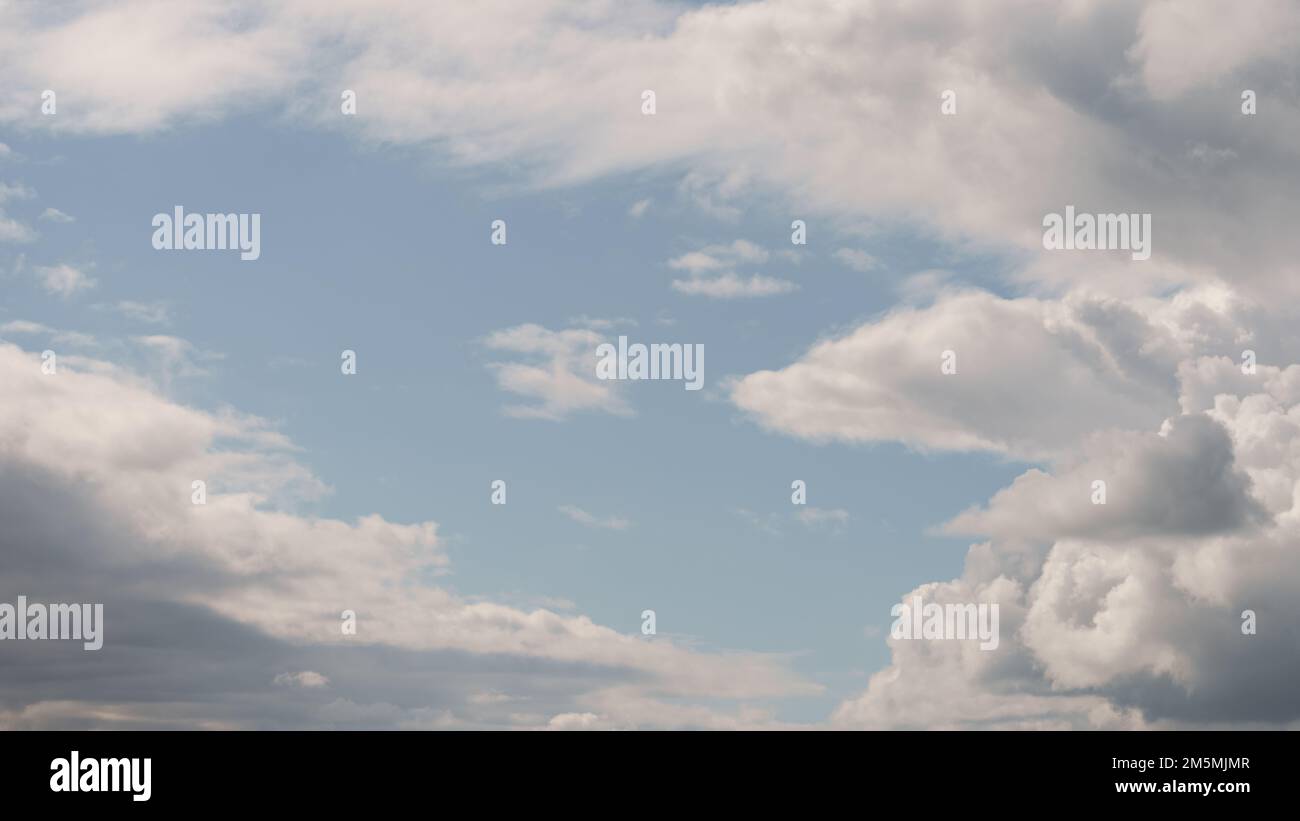 White cumulus clouds on a blue sky, nature background Stock Photo - Alamy