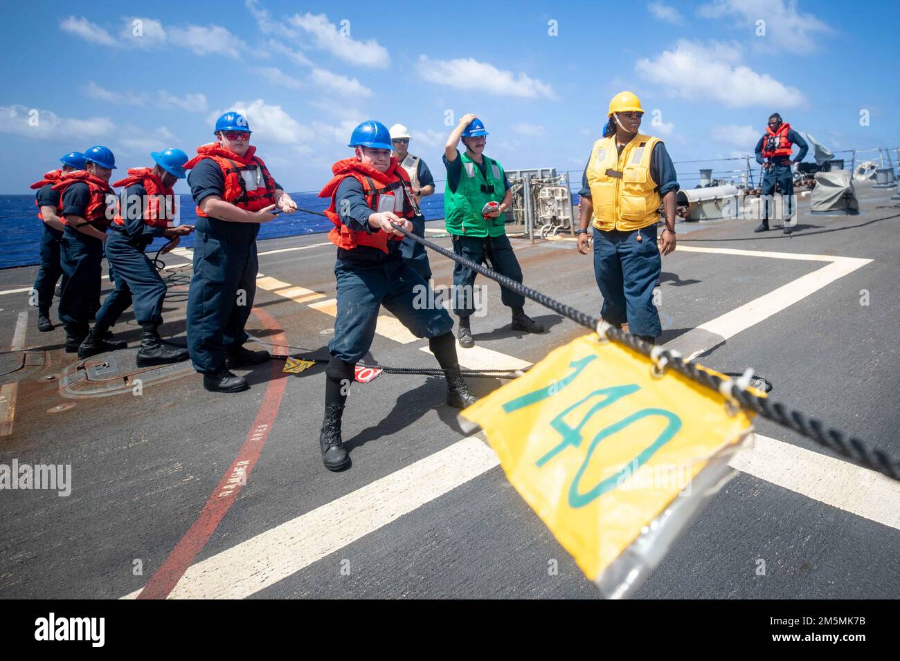 220326-N-KW492-1210 PHILIPPINE SEA (March 26, 2022) Sailors handle a ...