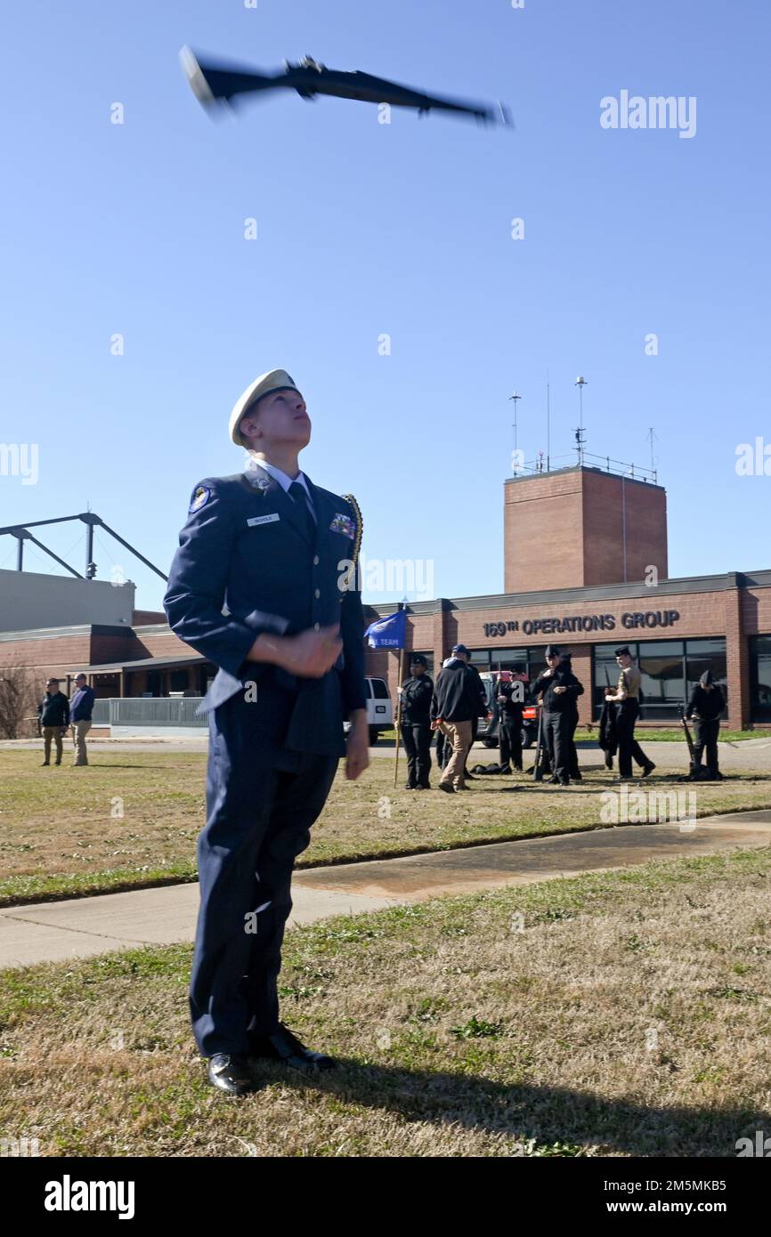 A student from the Sumter High School IDR Individual team from Sumter, South Carolina practices before his event during the annual Top Gun Drill Meet at McEntire Joint National Guard Base, South Carolina, March 26, 2022. High School Junior Reserve Officers Training Corps cadets from twenty high schools from across the state competed in twelve drill and ceremony events sponsored by the South Carolina Air National Guard. Stock Photo