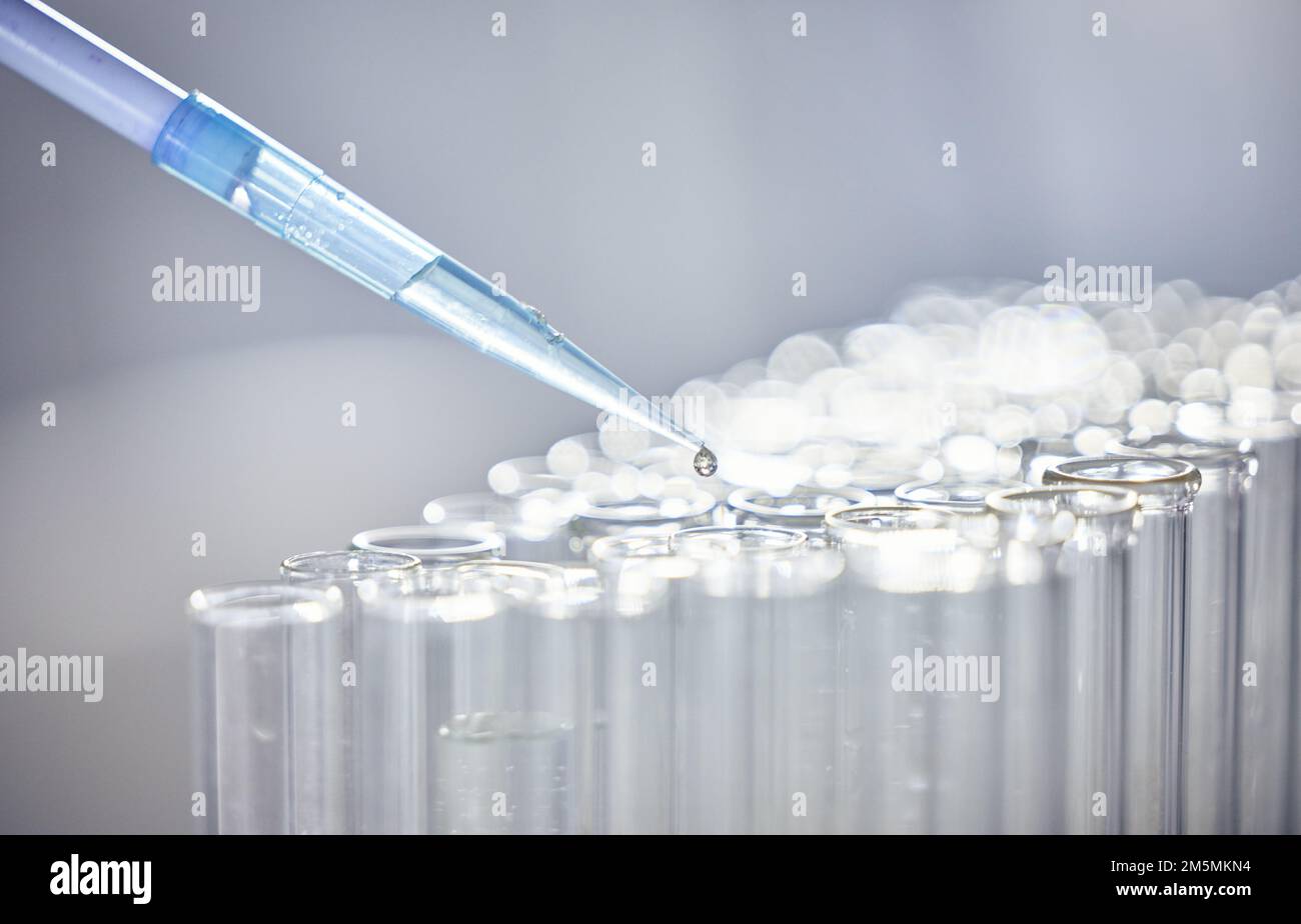Science, test tubes and syringe for research, experiment or project in chemistry laboratory. Glass vials, innovation and chemical liquid for Stock Photo