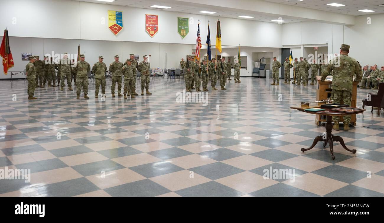 (Right) Col. John Pippy, outgoing commander of the 55th Maneuver Enhancement Brigade, 28th Infantry Division, addresses the Soldiers of the brigade for the last time during the 55th MEB change-of-command ceremony at Fort Indiantown Gap, Pa., on March 26, 2022. Pippy thanked the Soldiers of the brigade for their hard-work and dedication to the state and their communities during his service as their commander Stock Photo