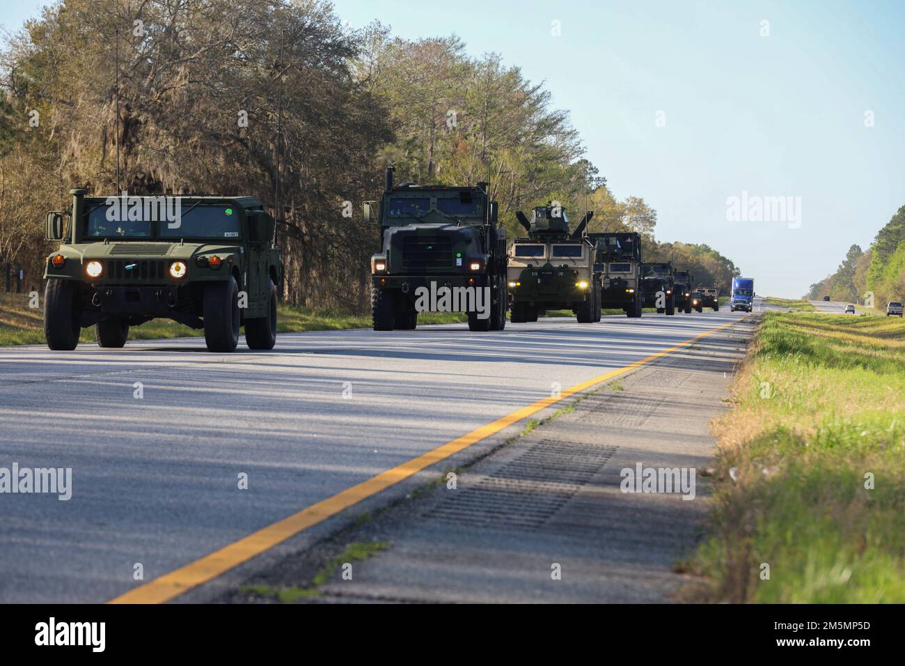 U.S. Marines with 3rd Landing Support Battalion, Combat Logistics Regiment 3, 3rd Marine Logistics Group, conduct a long-haul convoy during exercise Atlantic Dragon, South Carolina, Mar. 26, 2022. 3rd LSB is conducting Atlantic Dragon 22 in collaboration with CLR-37, 3rd MLG, and Combat Logistics Battalion 451, CLR-45, 4th MLG, to offload, inspect, and prepare equipment for a diverse array of purposes across the Marine Corps. During the exercise, 3rd LSB is testing capabilities on conducting a long-haul convoy in order to prepare forces for future operations and foster force readiness througho Stock Photo