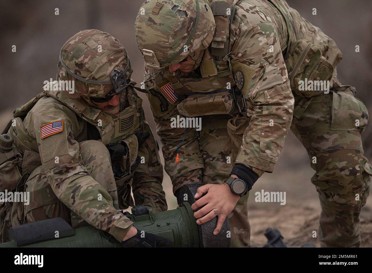 Soldiers from Charlie Company prepare the first Javelin Missile for
