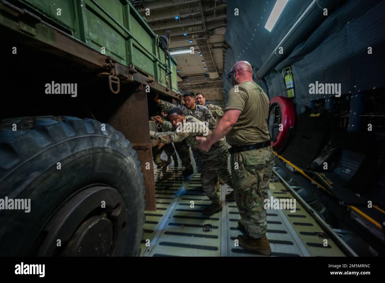 U.S. Airmen with 22nd Airlift Squadron, Air Mobility Command, and U.S
