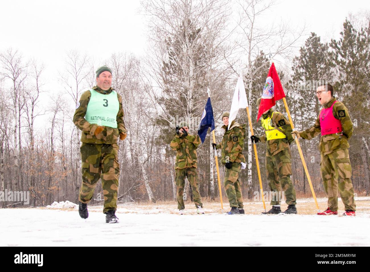 Norwegian Youth Soldiers, participating in the Norwegian Exchange at Camp Ripley, completed a 5K running biathlon March 30, 2022. The race is part of are larger competition known as the North Star Stakes program and includes other competitions such as best bay, Field Leadership Reaction Course, M17 pistol qualification, M4 carbine rifle qualification, and land navigation, where the three squads earn points towards winning the best youth squad during the 49th annual Norwegian Exchange. (Minnesota National Guard Photo by Sgt. Mahsima Alkamooneh) Stock Photo