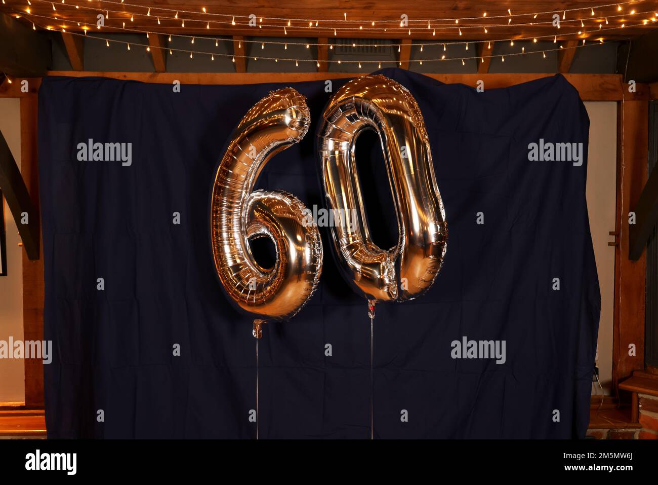 60 Balloons pictured at a 60th Birthday party in Hampshire, UK. Stock Photo