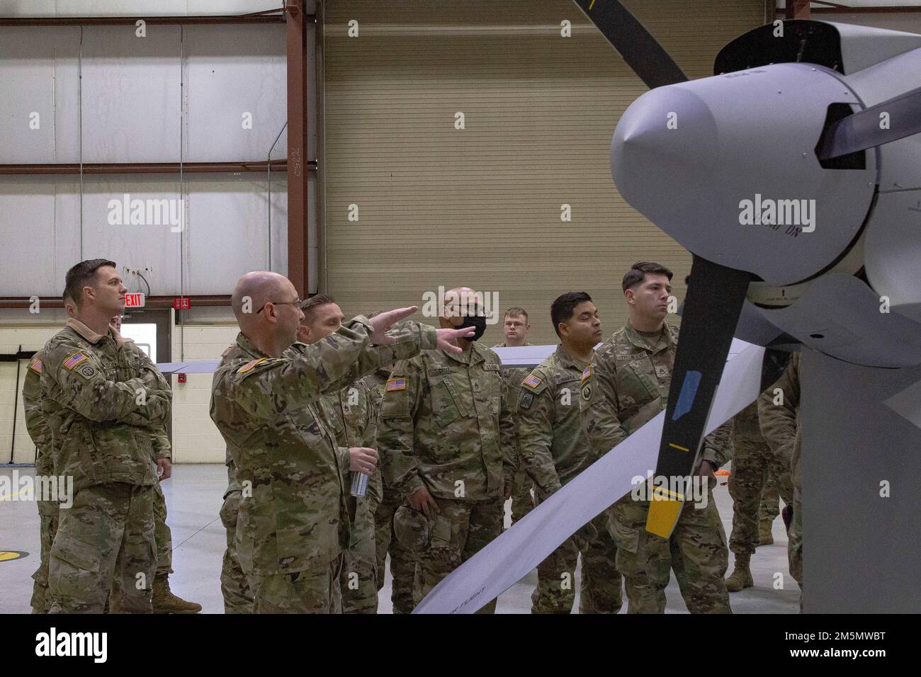 U.S. Army Soldiers attending the Advanced Leaders Course at the U.S. Army Aviation Center of Excellence Noncommissioned Officer Academy - Fort Eustis apply knowledge they learned about leadership March 28, 2022 during the Commandants Challenge and weight & balance procedures by weighing different airframes found in the army fleet at Fort Eustis, Virginia. Stock Photo