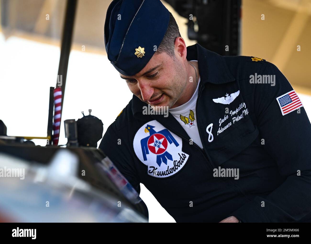 Maj. Jake Impellizzeri, U.S. Air Force Air Demonstration Squadron advance pilot and narrator, exits the cockpit of Thunderbird No. 8 at Shaw Air Force Base (AFB), South Carolina, March 28, 2022. Impellizzeri arrived at Shaw AFB prior to the Shaw Air & Space Expo April 2-3. Stock Photo