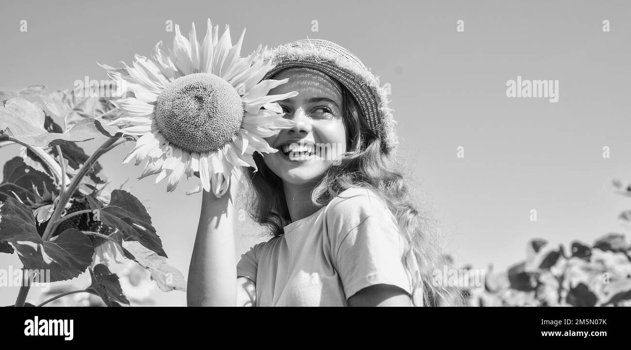 Baby and sunflower field Black and White Stock Photos & Images - Alamy