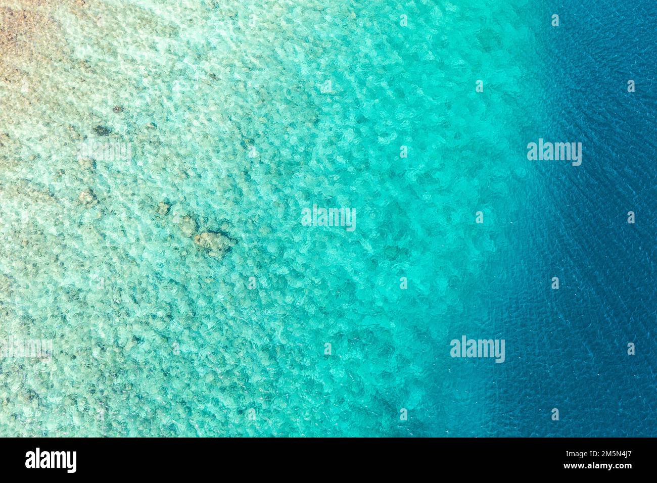 Amazing aerial of the beautiful atolls of Maldives. Sea plane flying above Maldives islands. Bird eye view of atolls from Maldives, aerial photography Stock Photo