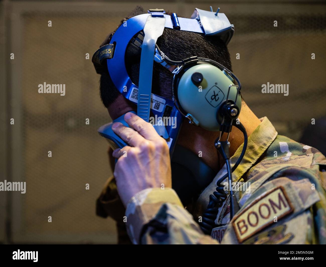 A U.S. Air Force in-flight refueling specialist assigned to the 908th Expeditionary Air Refueling Squadron conducts preflight checks on a U.S. Air Force KC-10 Extender at Prince Sultan Air Base, Kingdom of Saudi Arabia, March 29, 2022. The 908th EARS, deployed with Ninth Air Force (Air Forces Central), is responsible for delivering fuel to U.S. and partner nation forces, enabling airpower, deterrence, and stability. Stock Photo