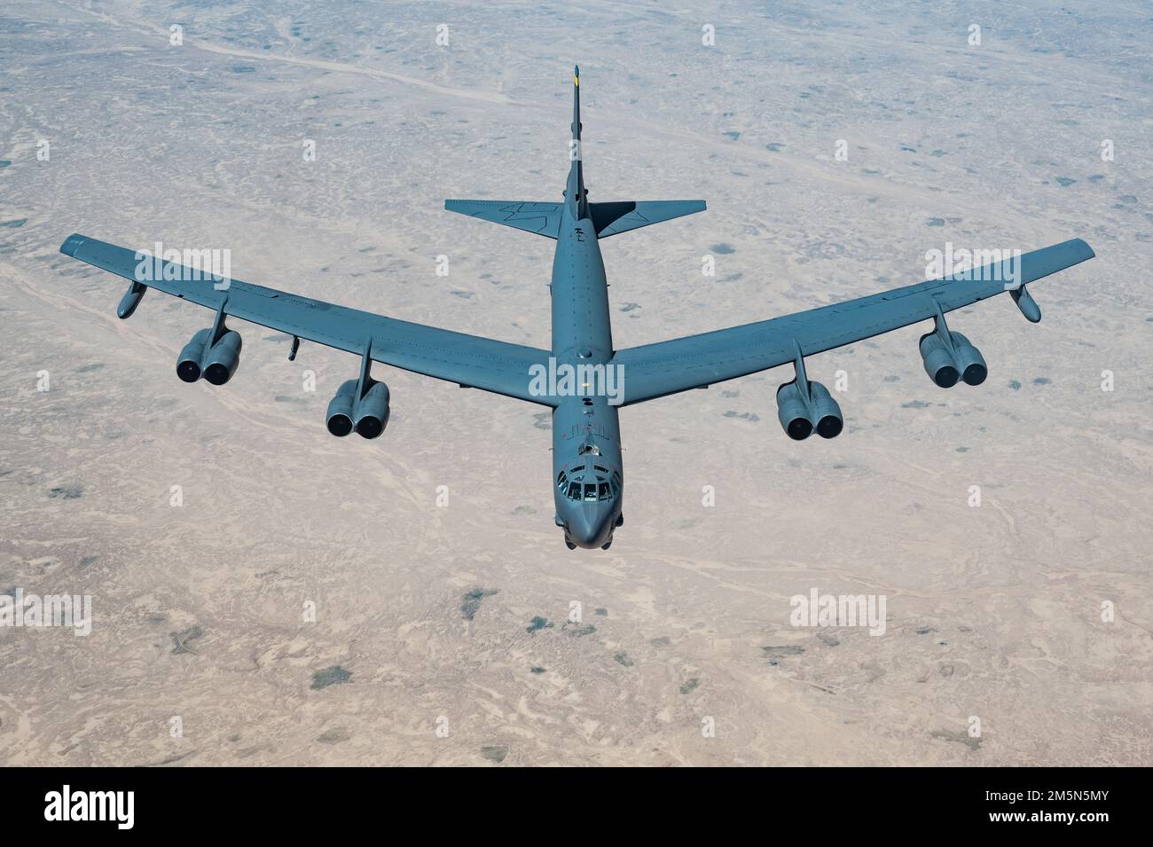 A U.S. Air Force B-52H Stratofortress flies above the Kingdom of Saudi Arabia, March 29, 2022. The presence of the B-52H showcased U.S. Central Command's ability to deliver combat airpower at a moment's notice, as well as its commitment to partners and regional security. Stock Photo