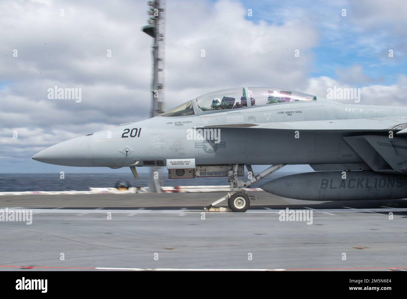 An F/A-18F Super Hornet, attached to the 'Blacklions' of Strike Fighter Squadron (VFA) 213, takes off from USS Gerald R. Ford’s (CVN 78) flight deck, March 29, 2022. Ford is underway in the Atlantic Ocean conducting flight deck certification and air wing carrier qualification as part of the ship’s tailored basic phase prior to operational deployment. Stock Photo