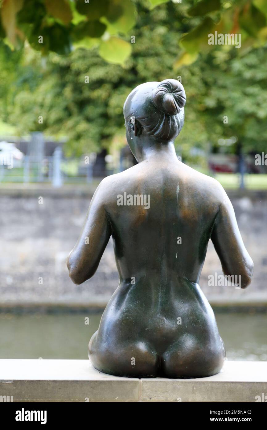 Nude sculpture of three girls and a boy by Wilfried Fitzenreiter by the  Spree river in Berlin, Germany, is a tourist attraction Stock Photo - Alamy