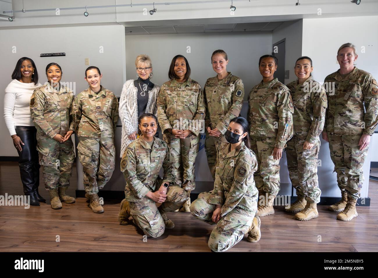 U.S. Air Force Airmen and U.S. Army Soldiers attend a women’s mentorship panel at Pope Army Airfield, North Carolina, March 29, 2022. The theme was “Promoting Healing and Providing Hope” and panelists included U.S. Air Force Maj Jasmine Candelario, CMSgt Lafoundra Thompson, SMSgt Jillian Erhardt, MSgt Kaisy Clark, MSgt Janee Tamayo, Ms. Karen Smith, Ms. Elenah Kelly, and SSgt Gabrielle Calloway, and U.S. Army LTC Mallory Wampler. (U.S. Air Force photo/Staff Sgt. Kyndal Lievano) Stock Photo