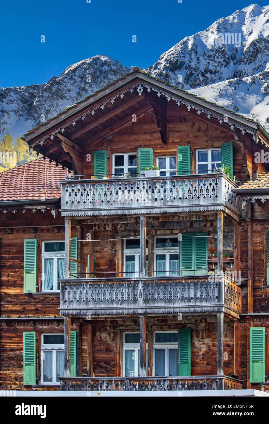 Old traditional wooden house in Switzerland Alps Stock Photo